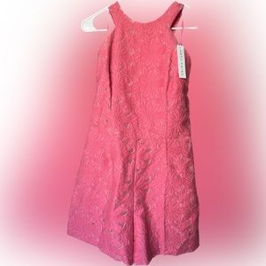 Beautiful pink Trina Turk romper with flowers, coral colored